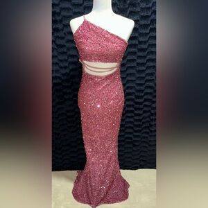 Size 0-2 small  The color is between pink and purple. The fabric is all sequence